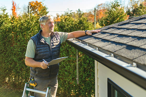 Professional Roofing technician working in Slater, MO